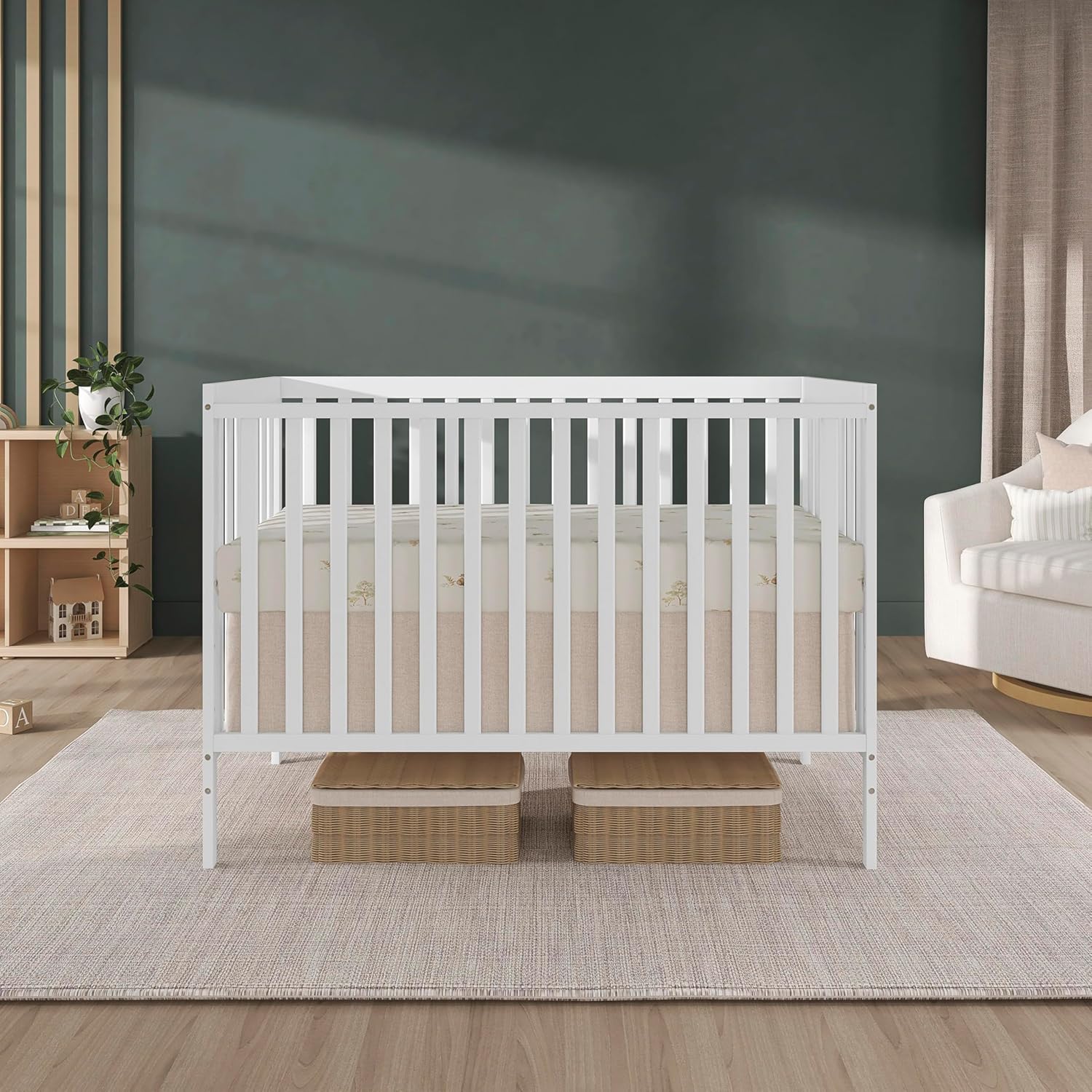 White sustainable pinewood 5-in-1 convertible crib with adjustable mattress height for newborn and toddler sleep — side