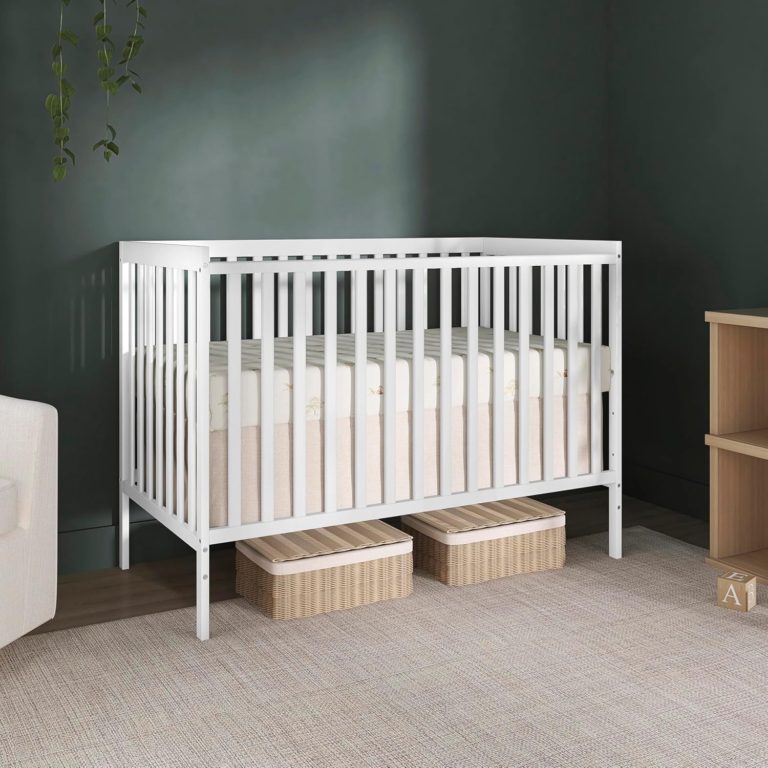 White sustainable pinewood 5-in-1 convertible crib with adjustable mattress height for newborn and toddler sleep — view 4