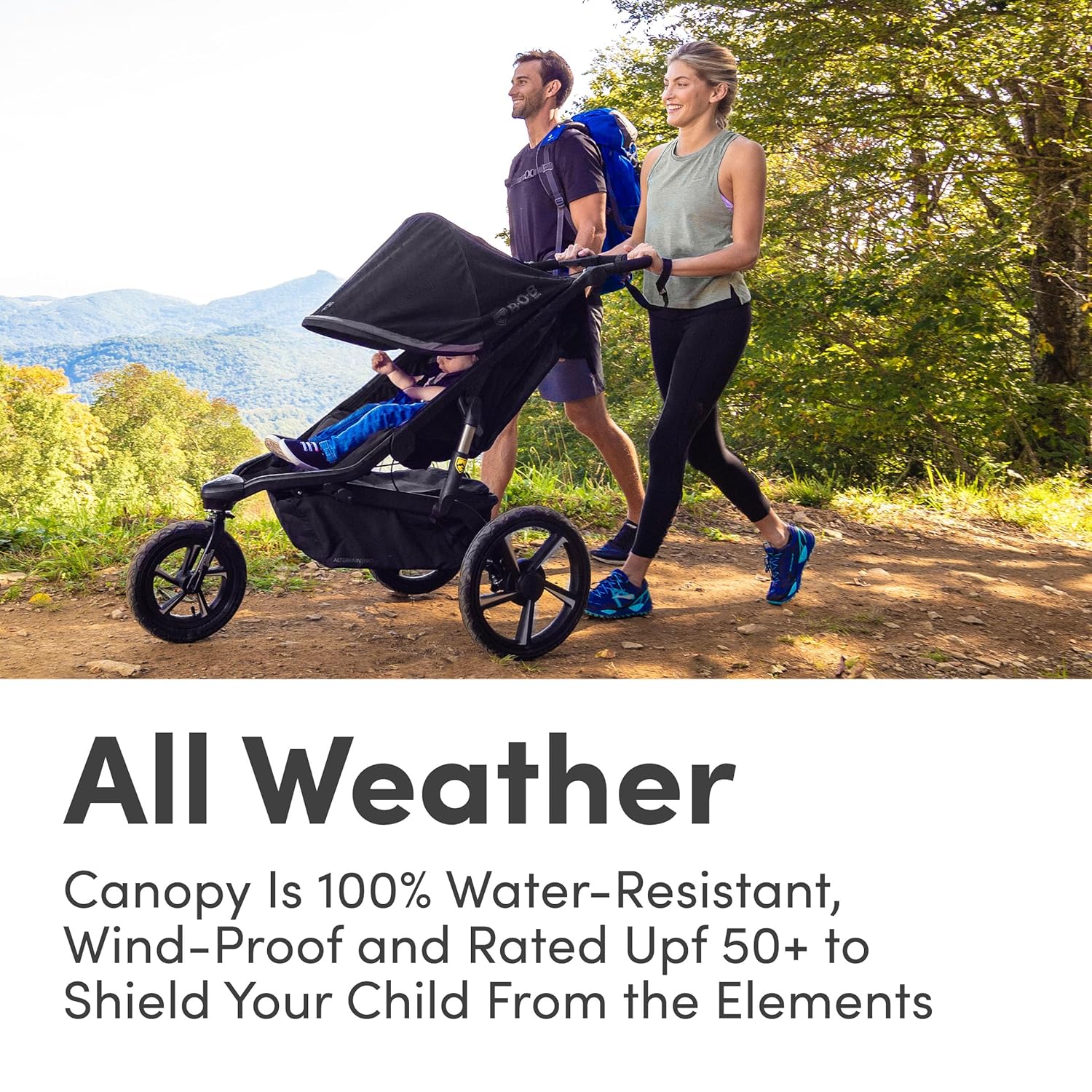 Alterrain Pro jogging stroller in black with SmoothShox suspension system, front swivel wheel visible — view 4