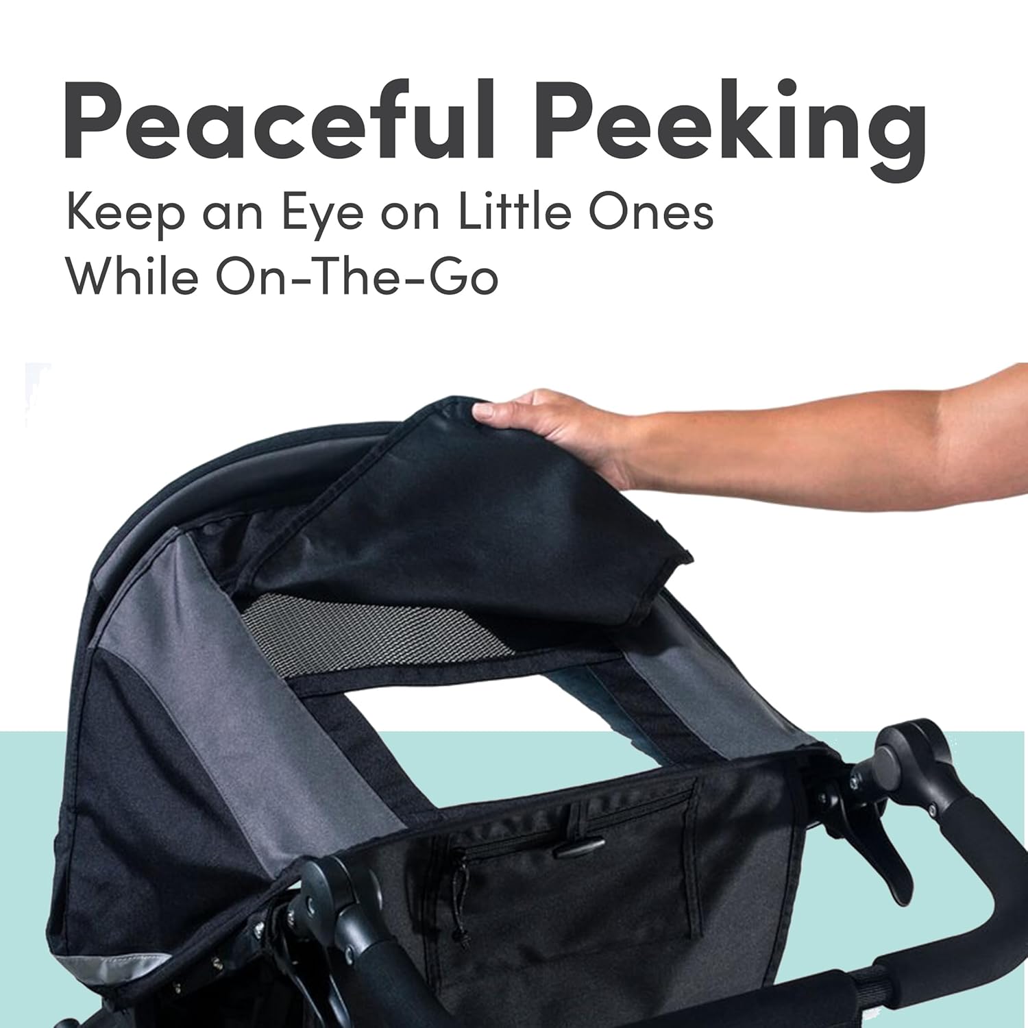 Modern graphite black jogging stroller with large all-terrain wheels and ergonomic parent handlebar for newborn and infant use โ view 2
