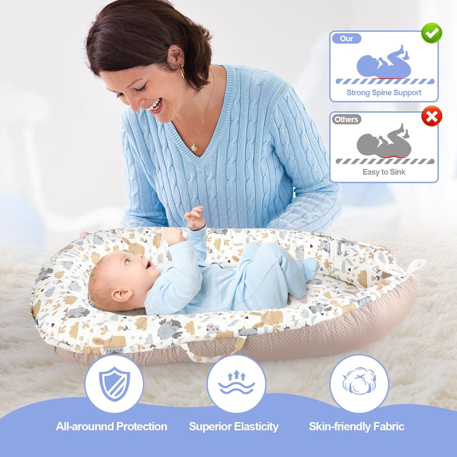 Cozy gray portable baby lounger nest with soft padding, designed for newborn sensory support and floor play — view 4