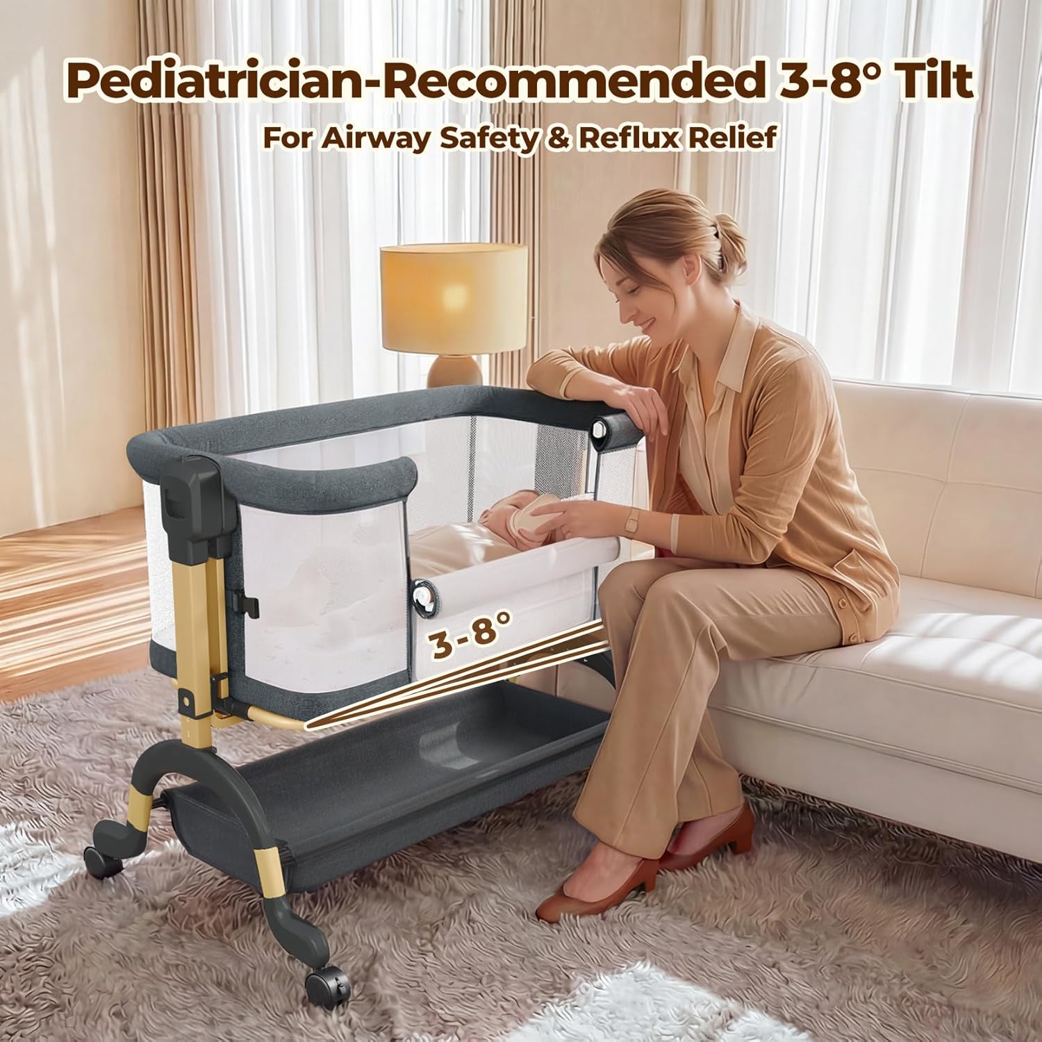 Modern 3-in-1 bassinet with full mesh sides, gray fabric, adjustable height mechanism, and lockable wheel base — view 2