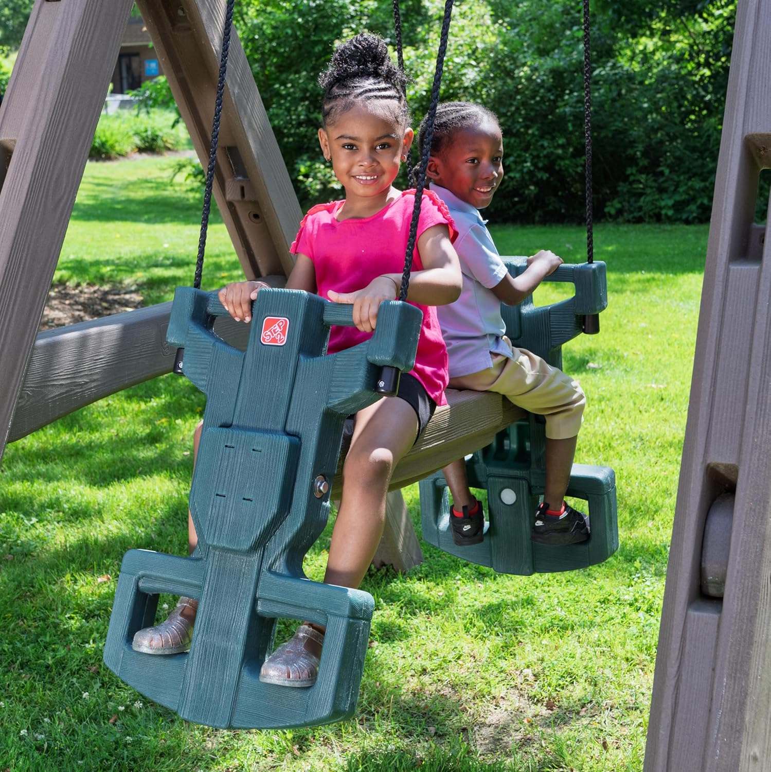 Step2 Naturally Playful Adventure Lodge outdoor playset with tan and brown panels, featuring integrated slide, swings, rope ladder, and basketball hoop for children ages 3-8 — view 5