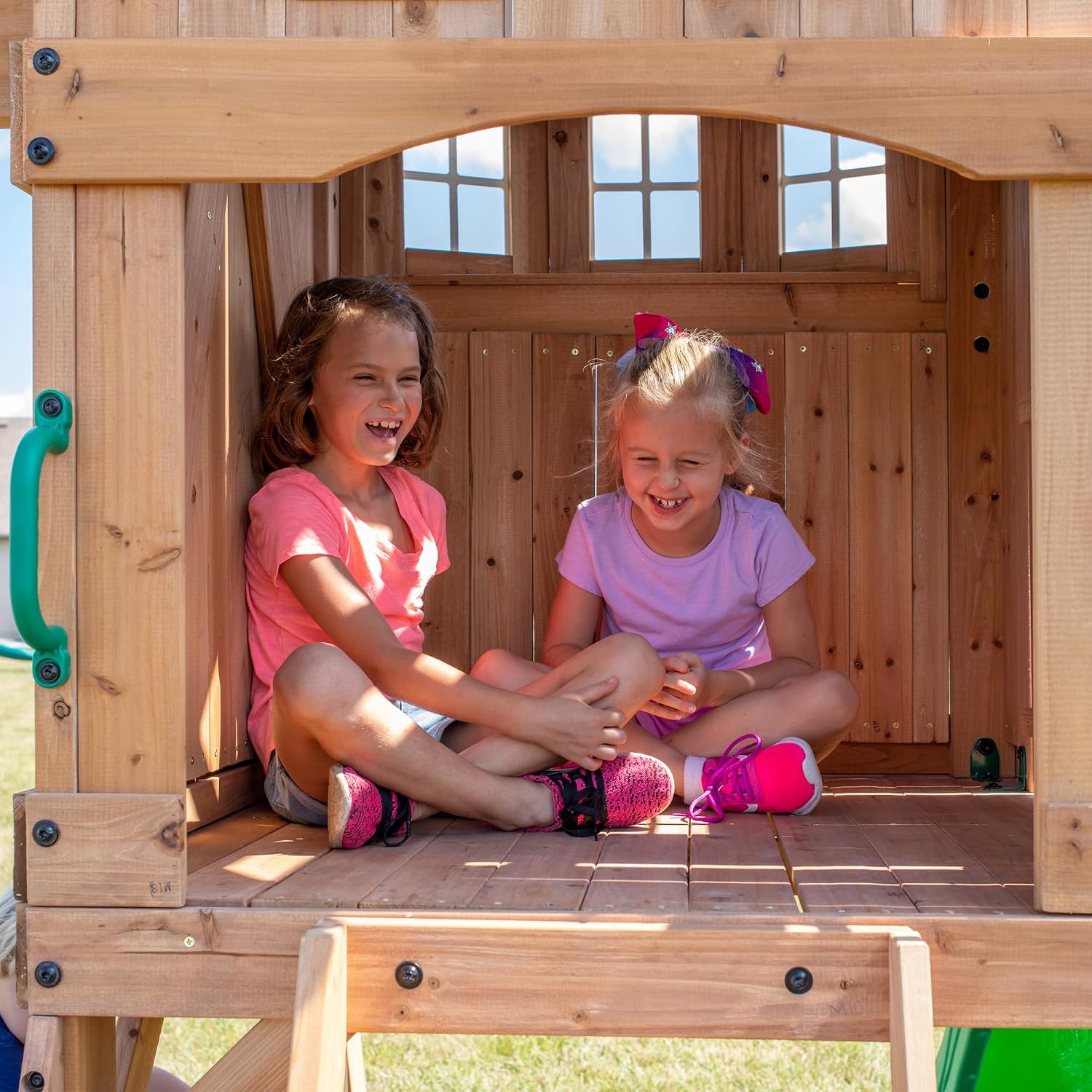 Cedar wood swing set with attached wave slide, clubhouse with working door, monkey bars, and dual belt swings — view 2