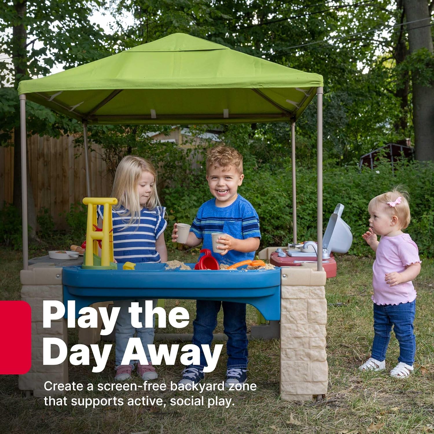 Beige outdoor playhouse with canopy shade, interactive play features, and space for multiple toddlers — view 2