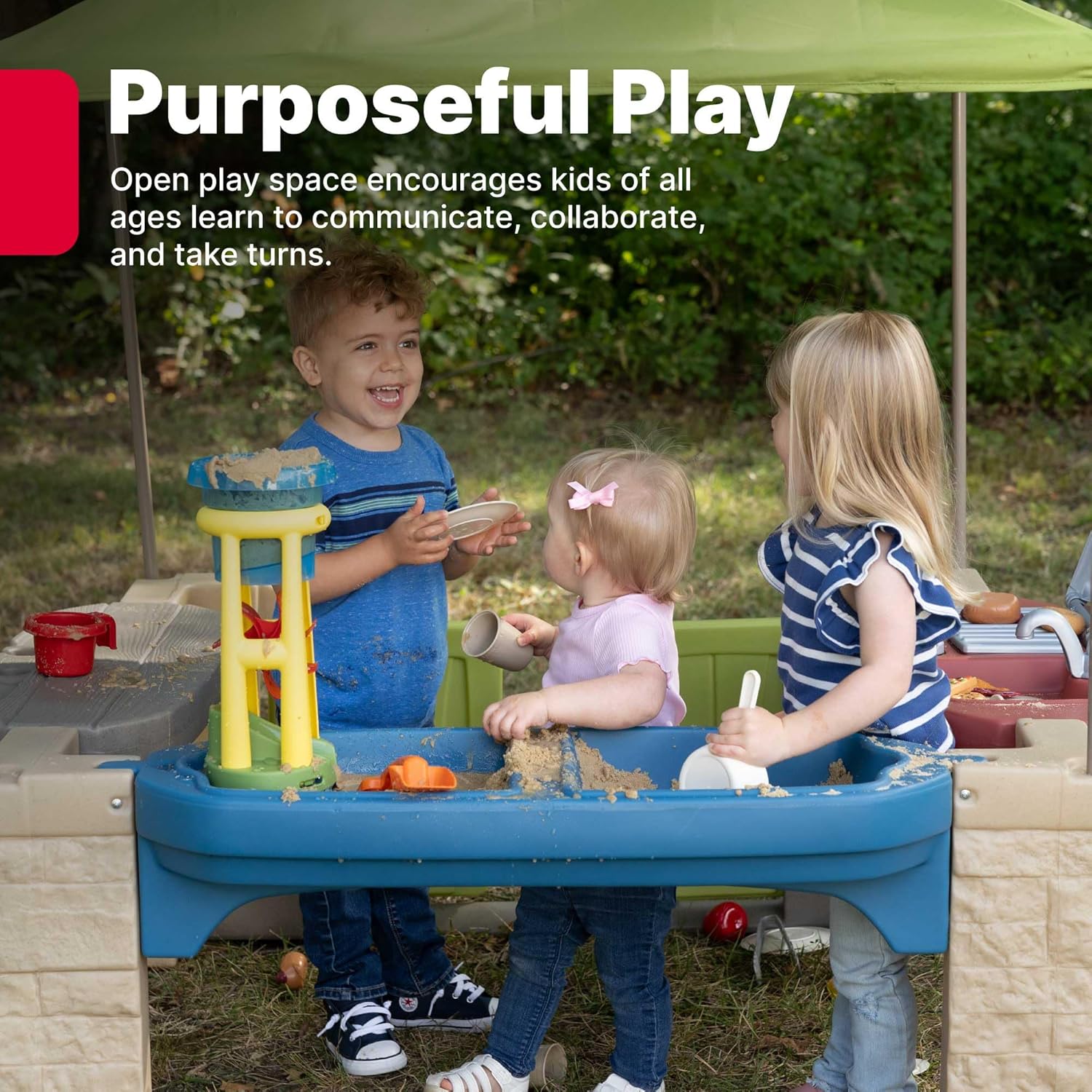 Beige outdoor playhouse with canopy shade, interactive play features, and space for multiple toddlers — detail