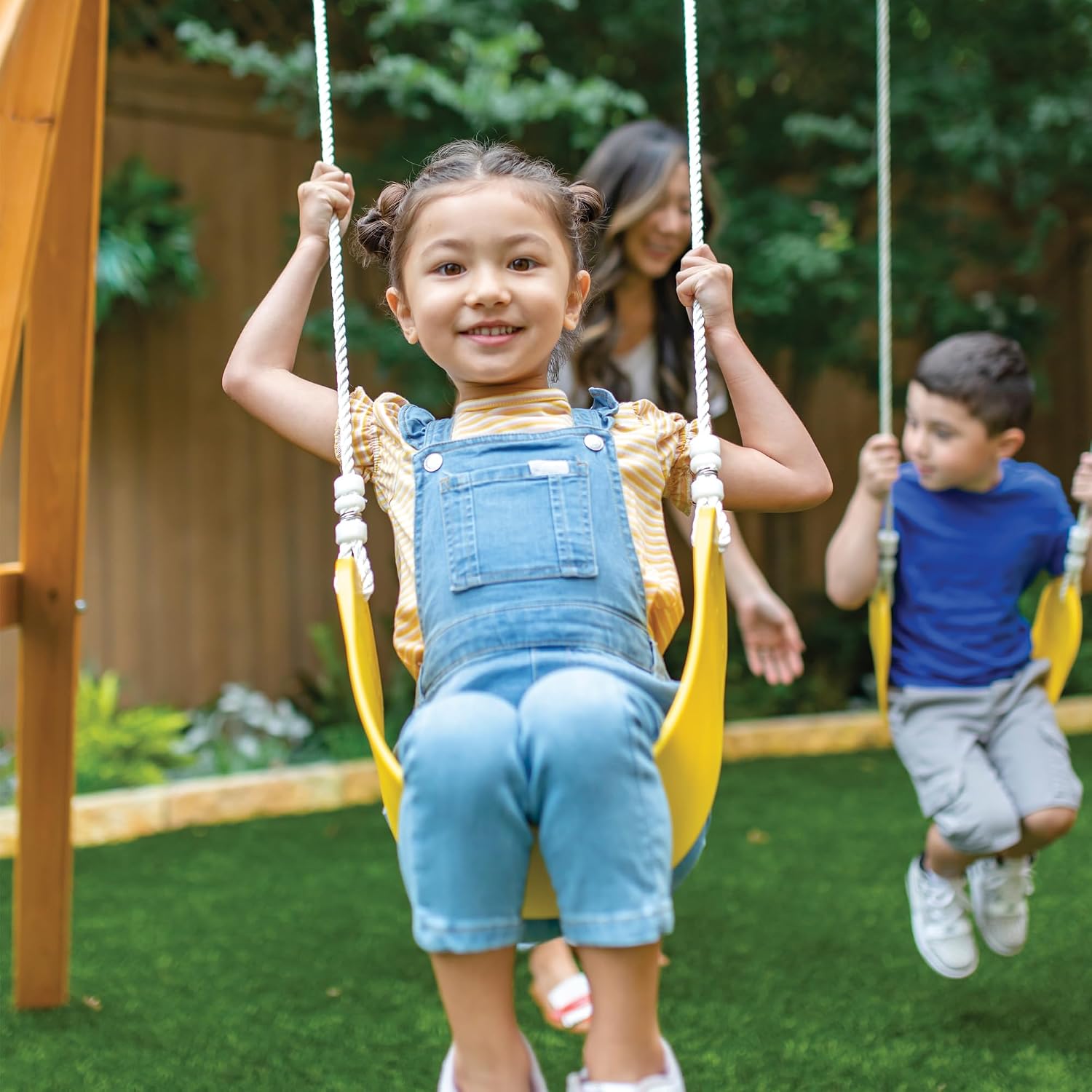 Classic wooden swing set with two swings and sturdy frame for toddler outdoor play โ view 2