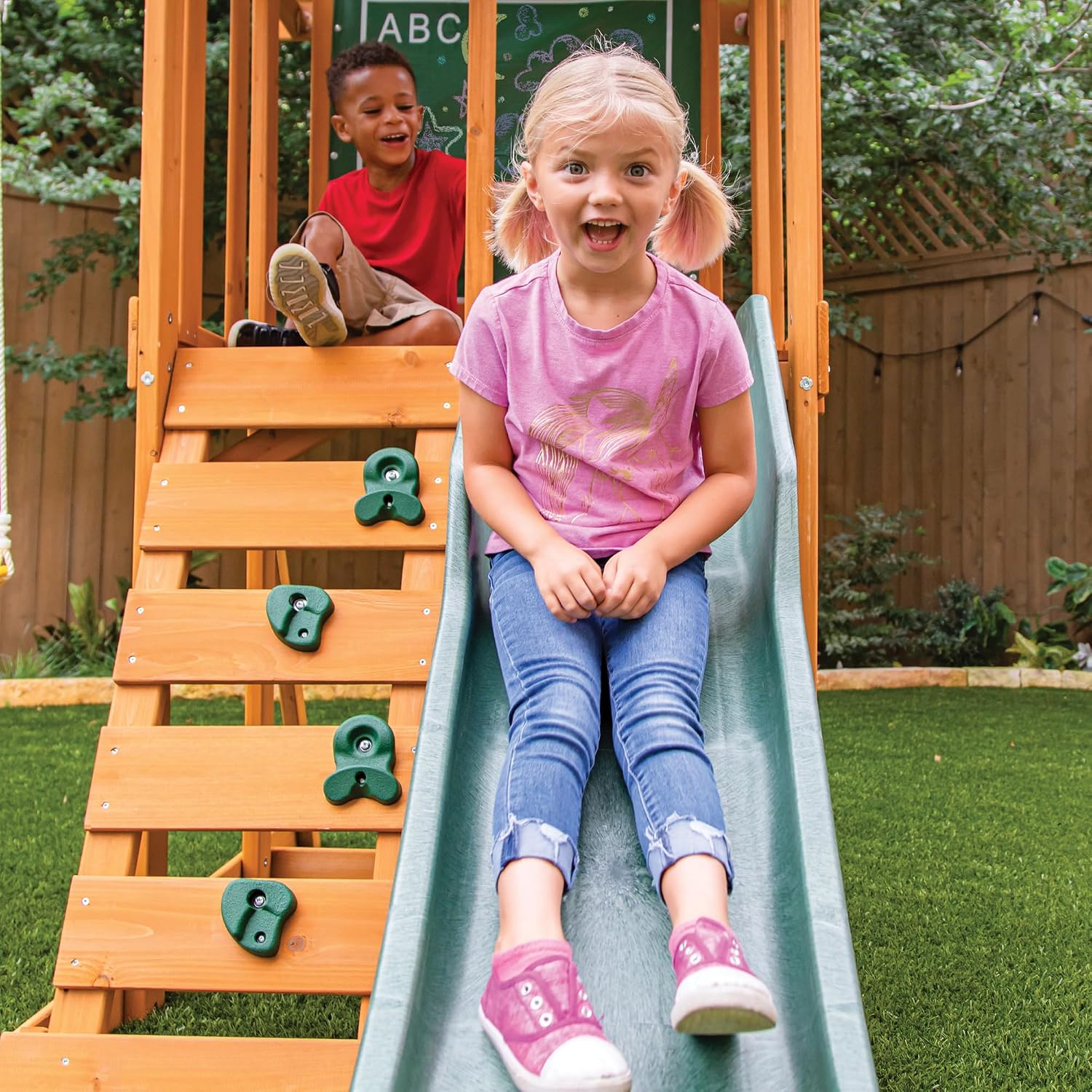 Classic wooden swing set with two swings and sturdy frame for toddler outdoor play โ view 3