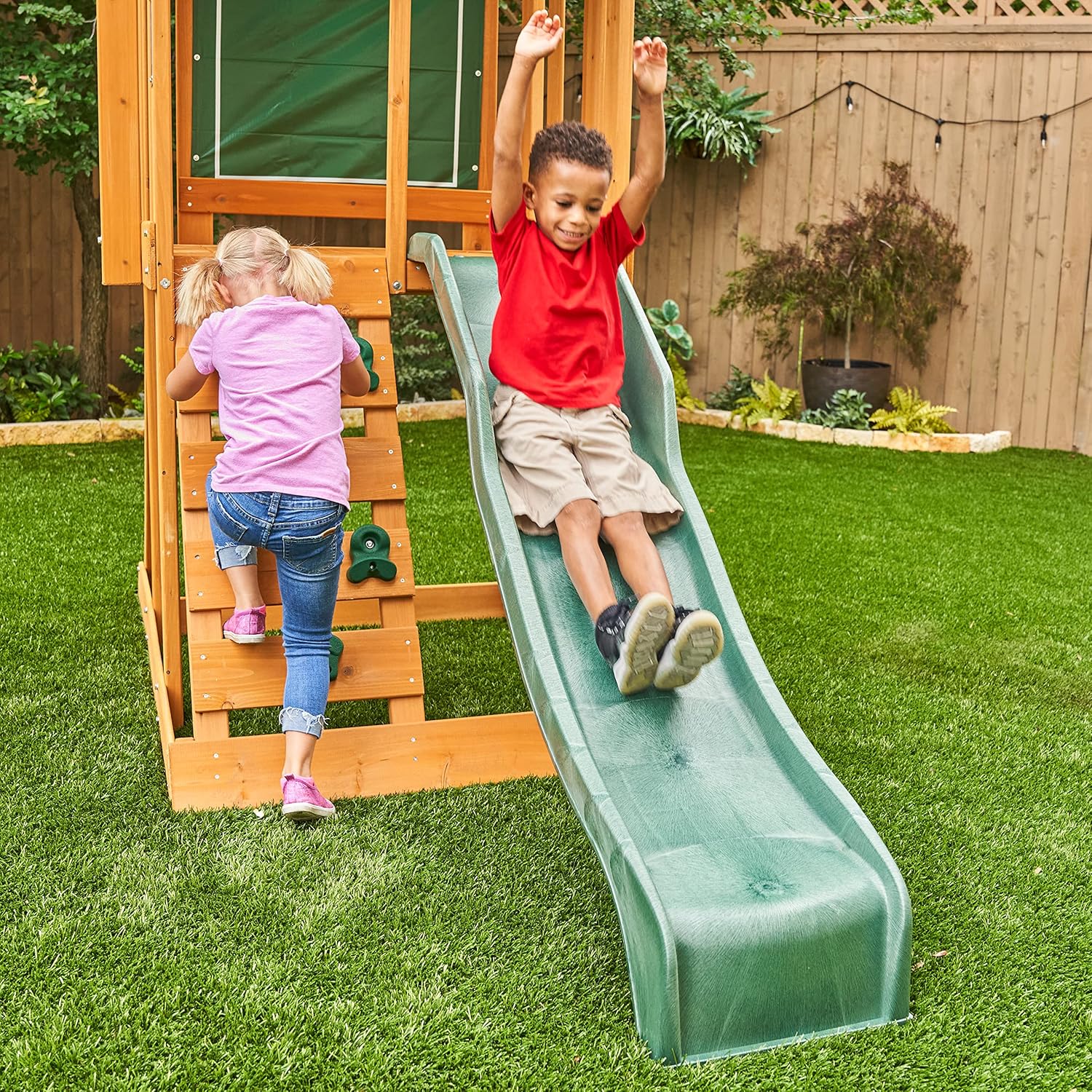Classic wooden swing set with two swings and sturdy frame for toddler outdoor play — view 3a
