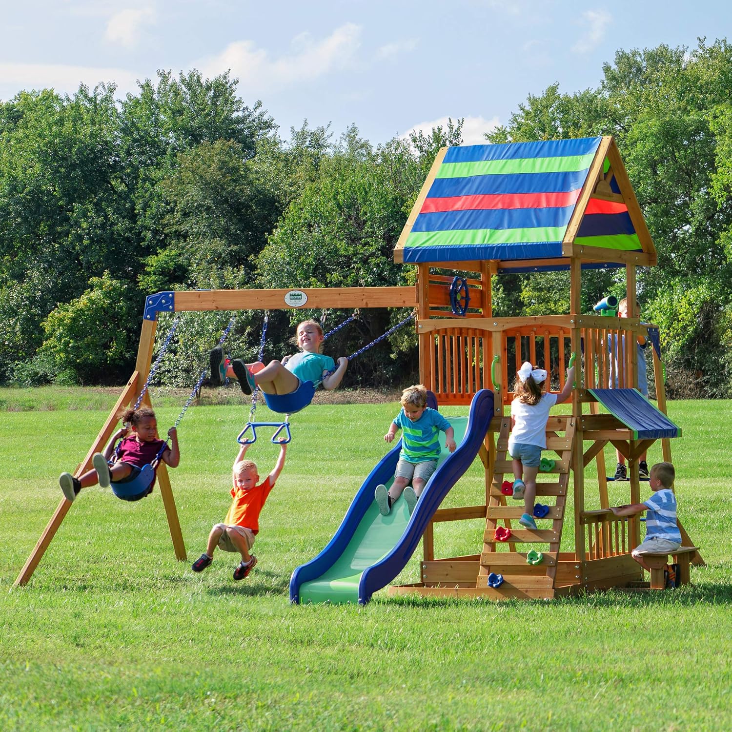 Cedar wood swing set with wave slide, monkey bars, rock wall ladder, and sandbox for kids — view 2