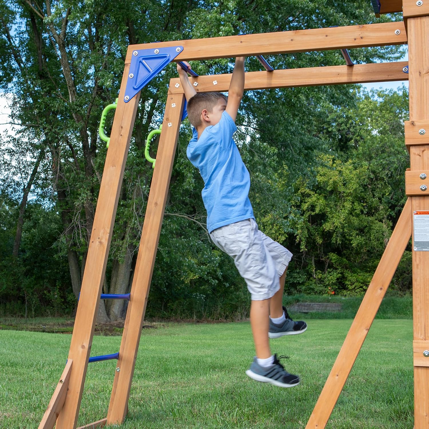 Cedar wood swing set with wave slide, monkey bars, rock wall ladder, and sandbox for kids — view 4