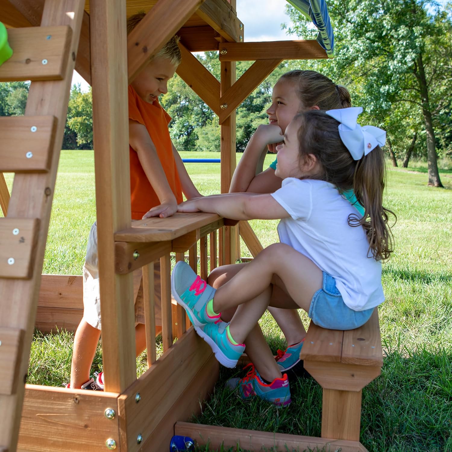 Cedar wood swing set with wave slide, monkey bars, rock wall ladder, and sandbox for kids — view 2