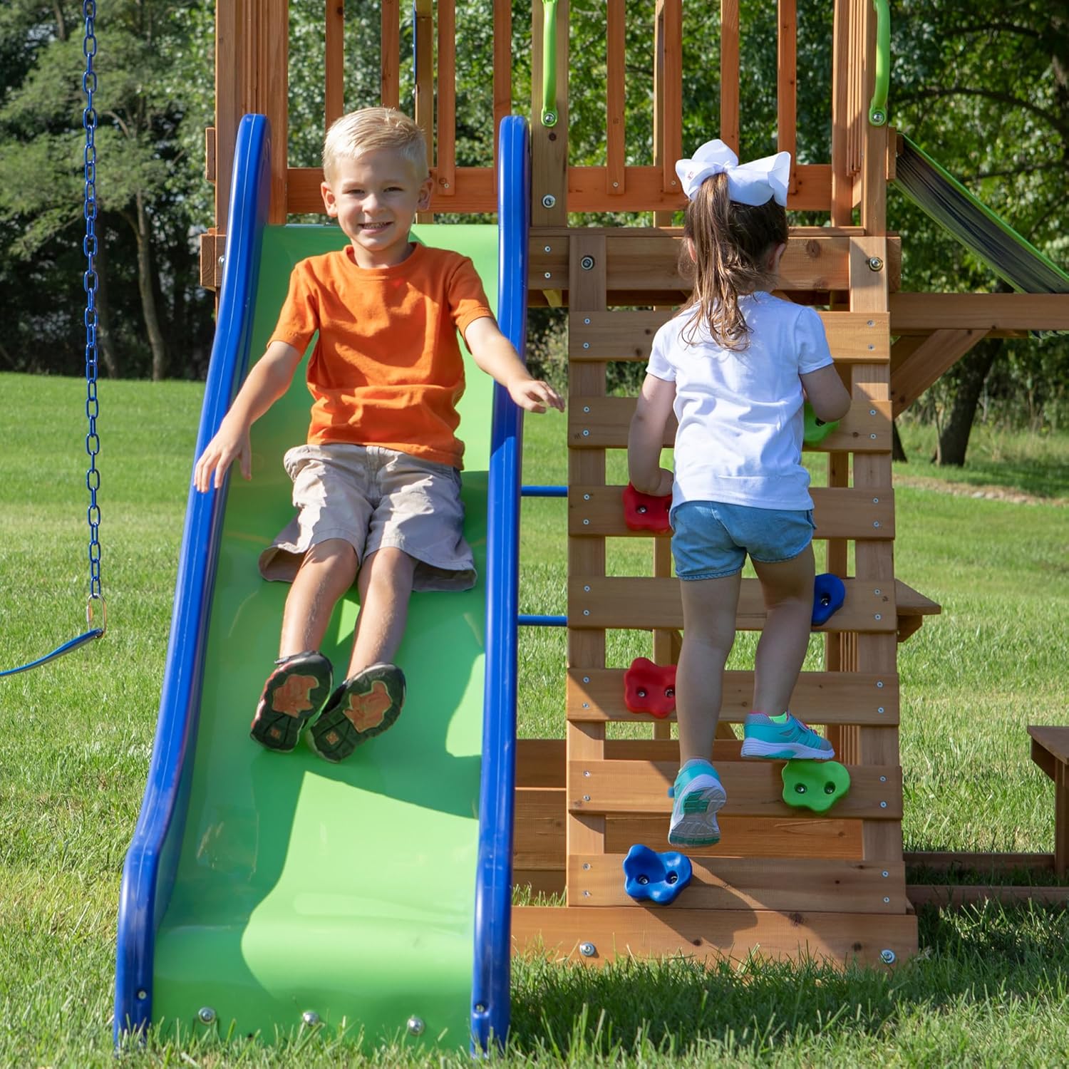 Cedar wood swing set with wave slide, monkey bars, rock wall ladder, and sandbox for kids — view 3