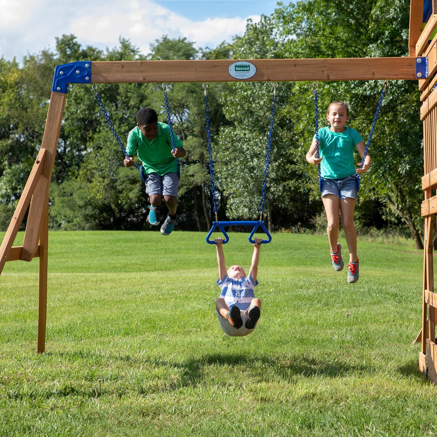 Cedar wood swing set with wave slide, monkey bars, rock wall ladder, and sandbox for kids — view 4