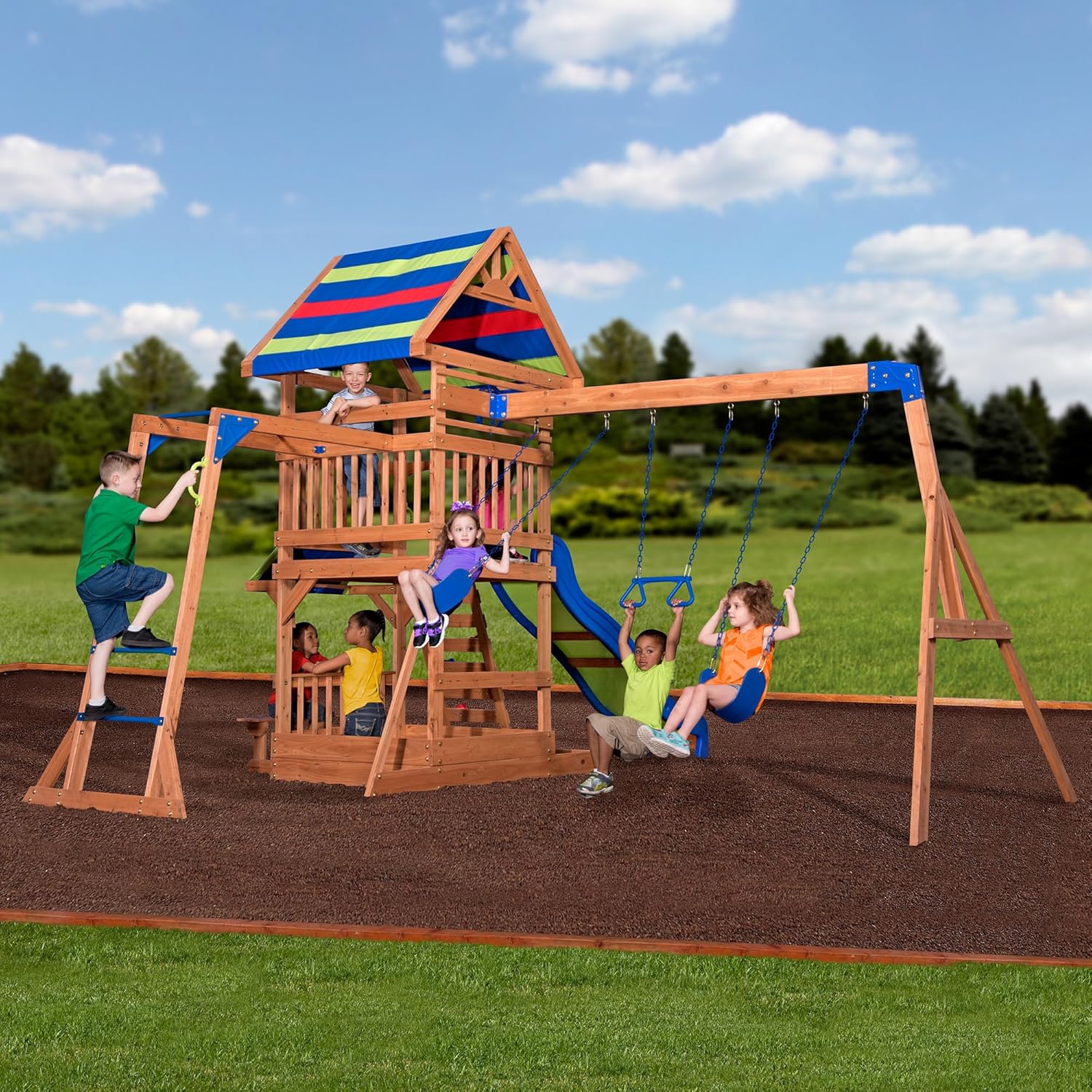 Cedar wood swing set with wave slide, monkey bars, rock wall ladder, and sandbox for kids — view 3a