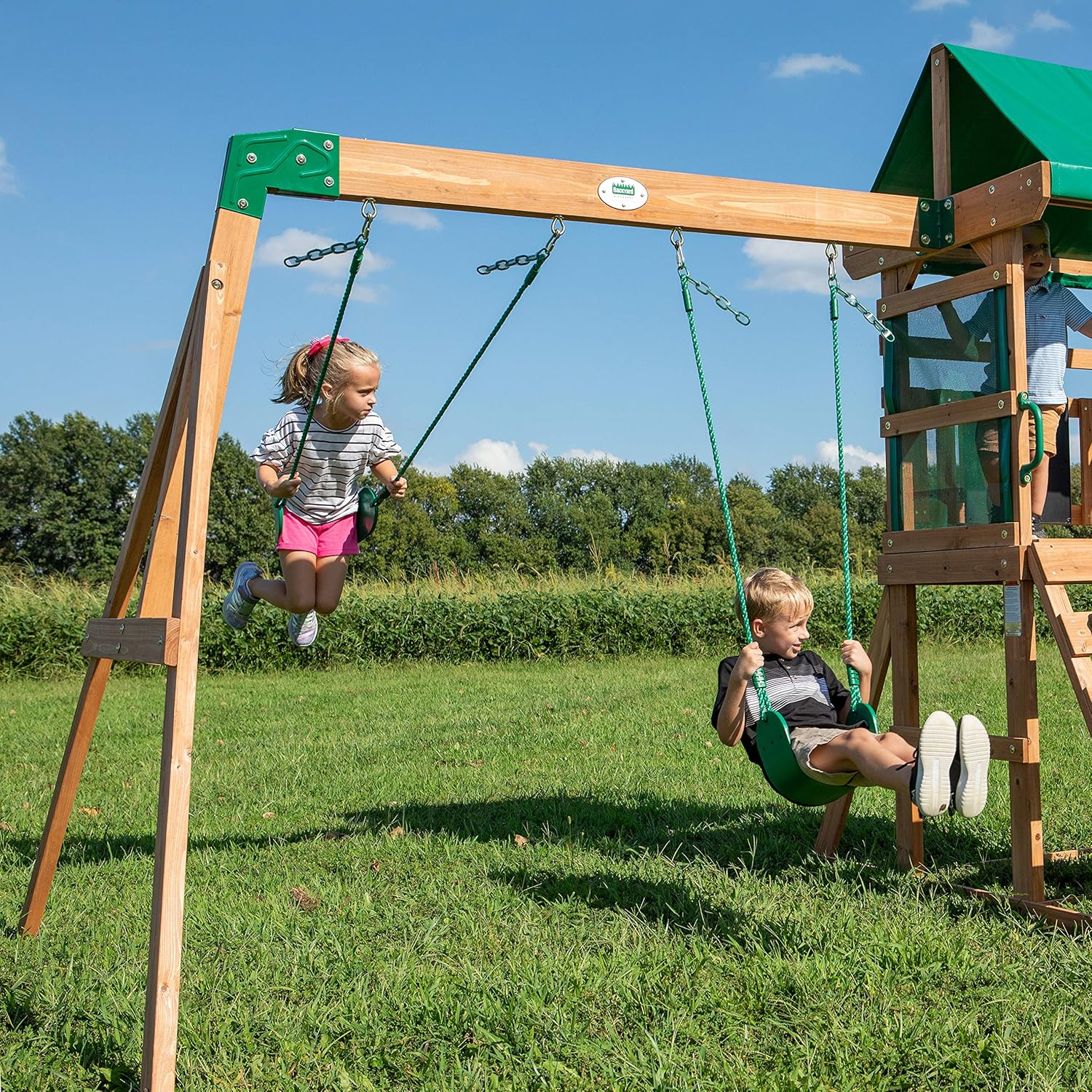 Cedar wood swing set with wave slide, play deck, and rock wall ladder for children ages 3-8 — view 4