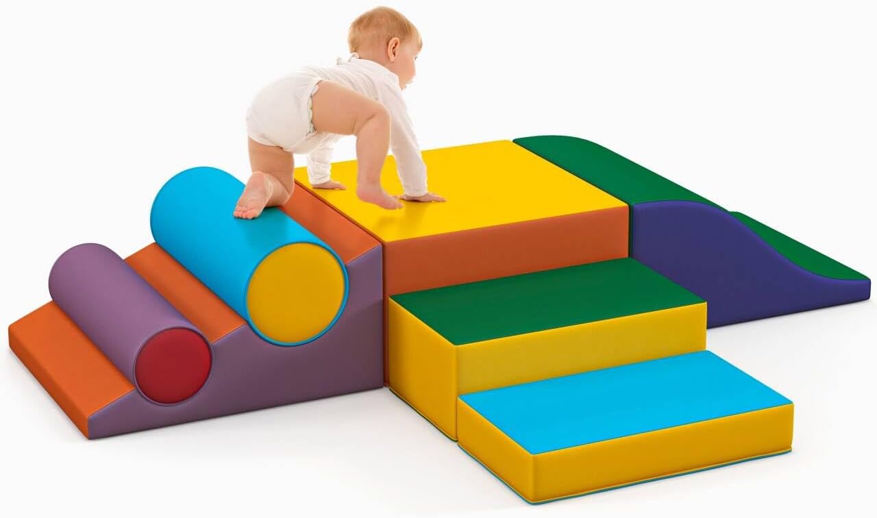 Seven soft foam climbing blocks in primary colors stacked and arranged for toddler play, featuring safe rounded edges for indoor climbing and sliding — view 5