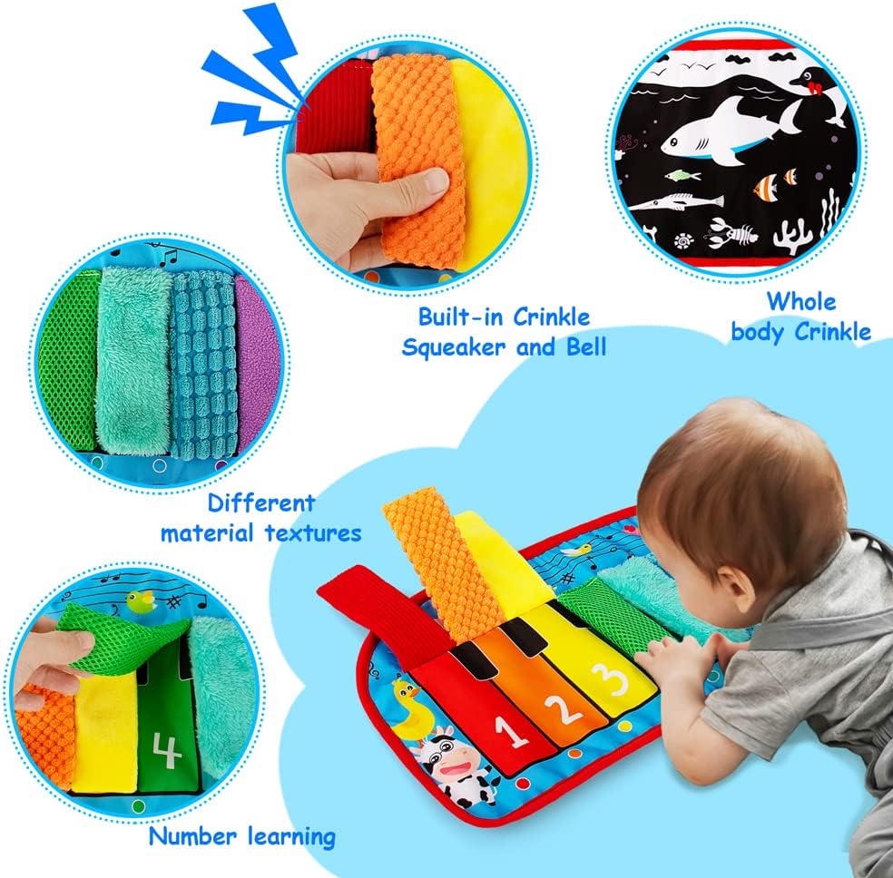 Black and white high contrast baby mirror toy with textured surfaces and squeaker for tummy time, mounted on tabletop for newborn sensory play — view 7a