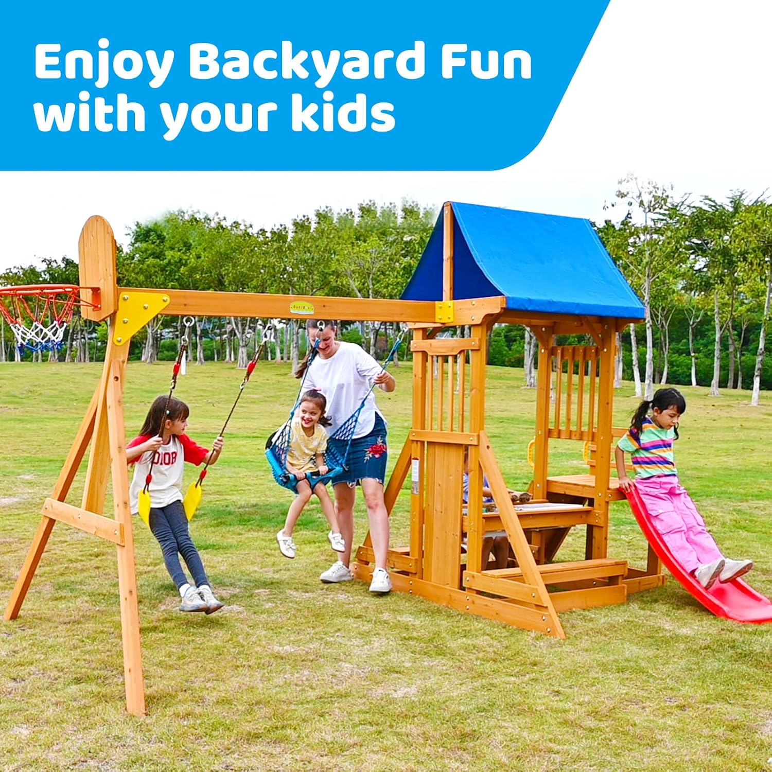 Natural wooden swing set with attached wave slide, rock climbing wall, and sandbox for preschool-age children — view 2