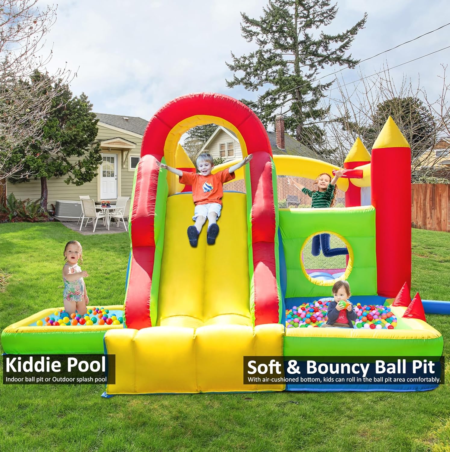 Large inflatable bounce house with tall blue slide, climbing wall, water pool, and colorful ball pit for backyard play — view 3