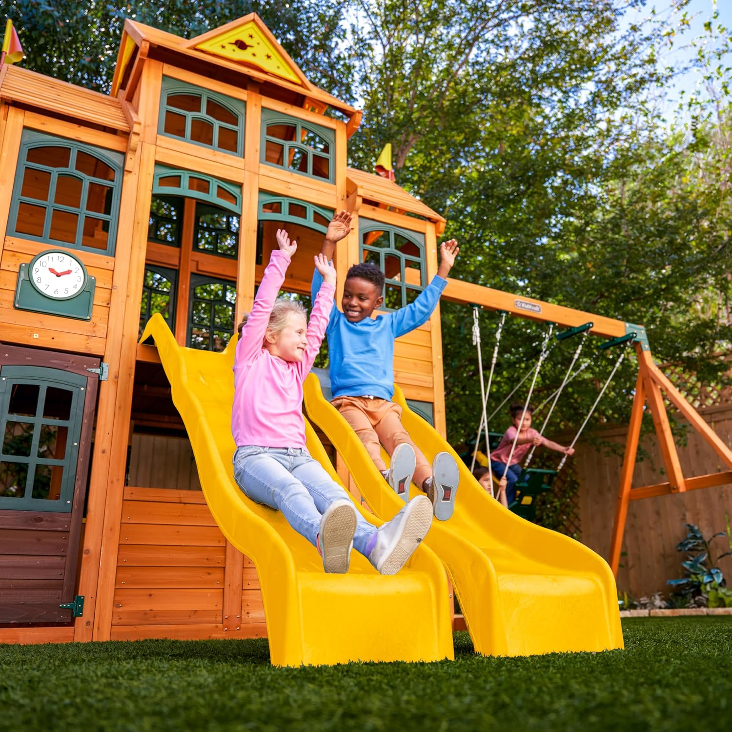 Wooden outdoor swing set with three slides, climbing wall, glider, and integrated play kitchen with cafe window for preschoolers — view 5a