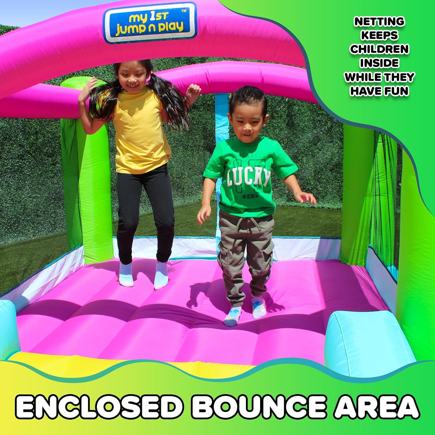 Inflatable bounce house with attached slide in bright primary colors, featuring heavy-duty blower unit — view 2